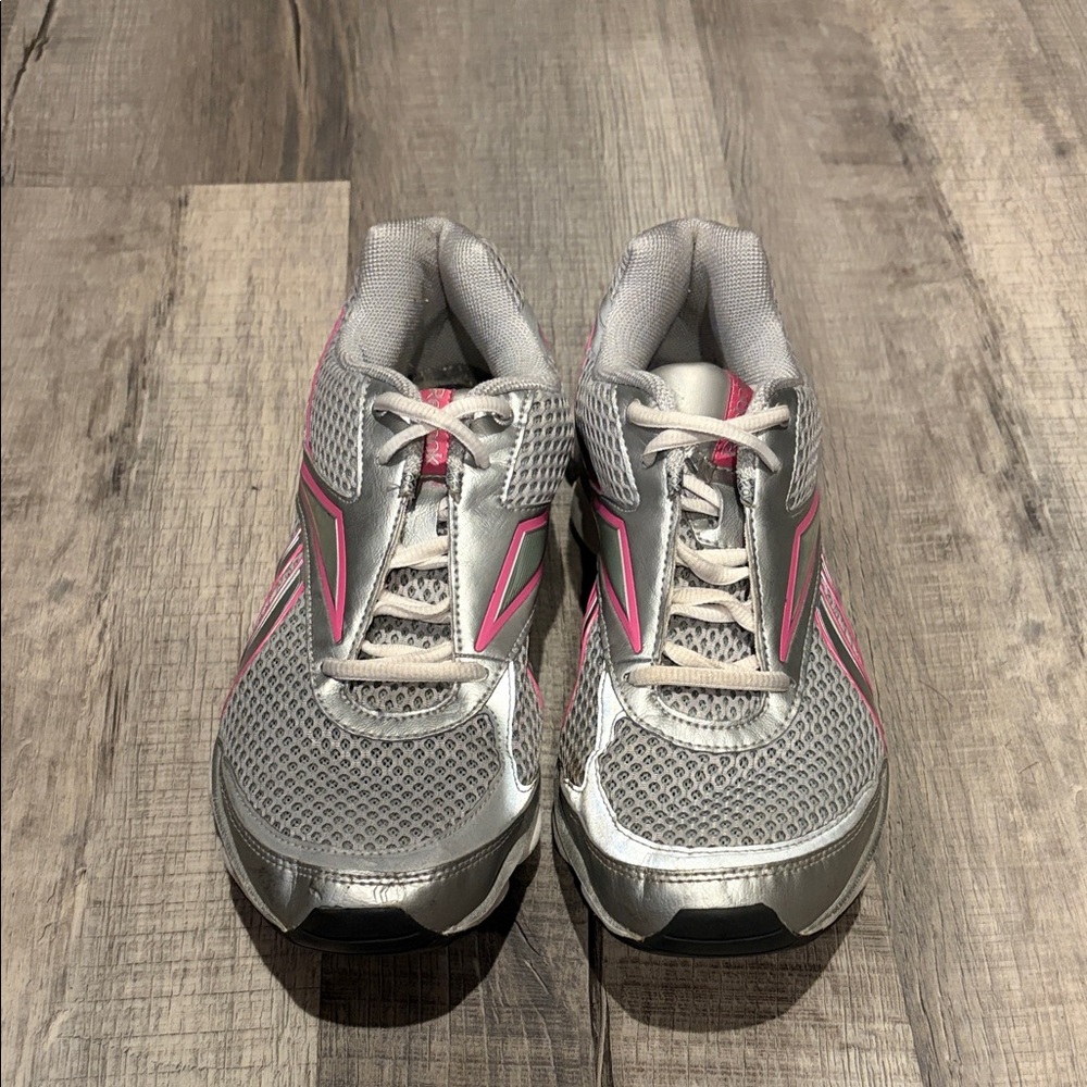 Women’s Silver and Pink Reebok Runtone, no insole included.